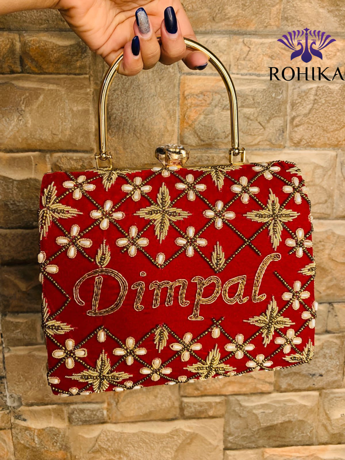 Customised embroidered clutch Red Rohika Store