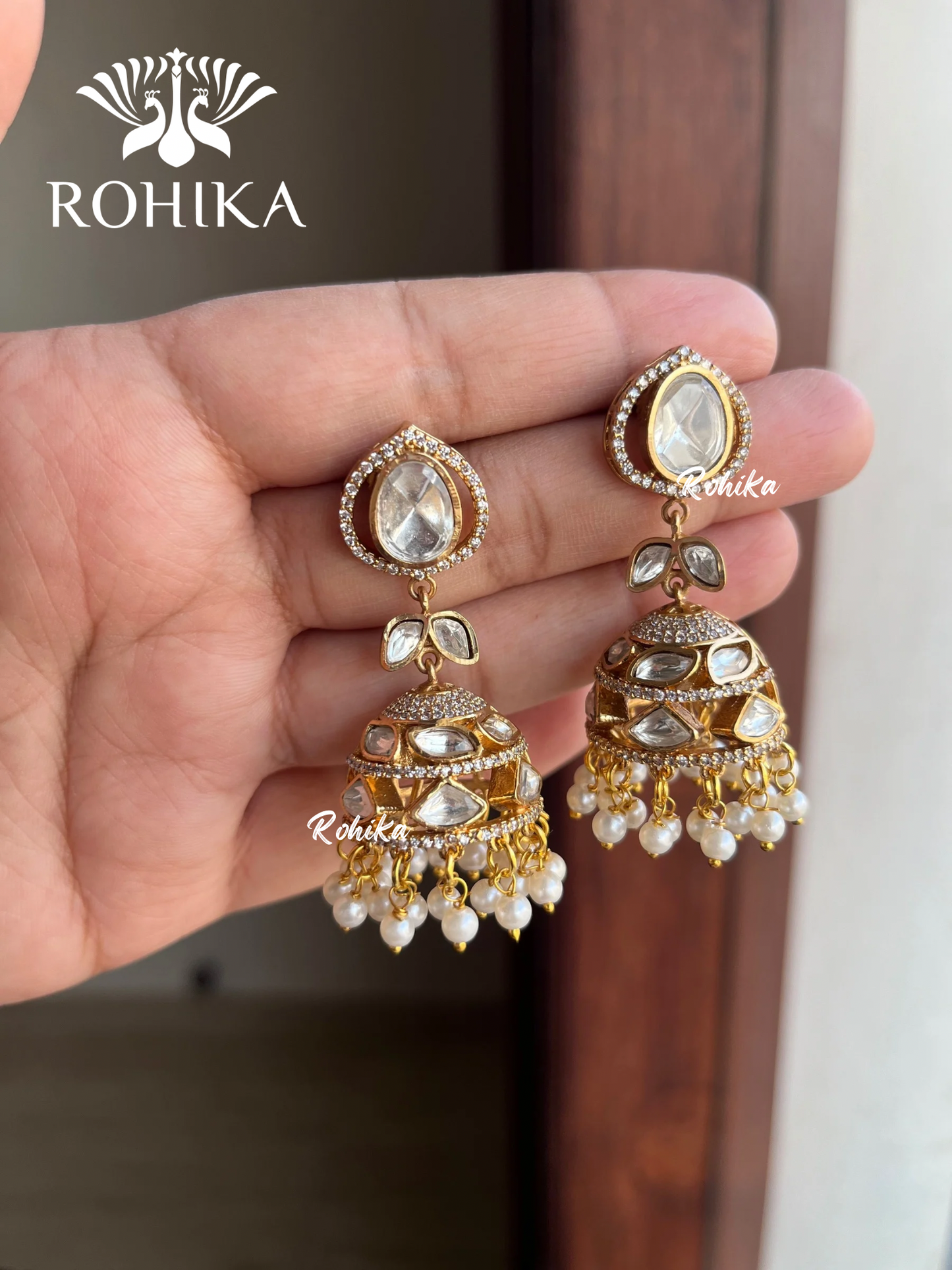 Nimra polki kundan jhumka earrings - Golden