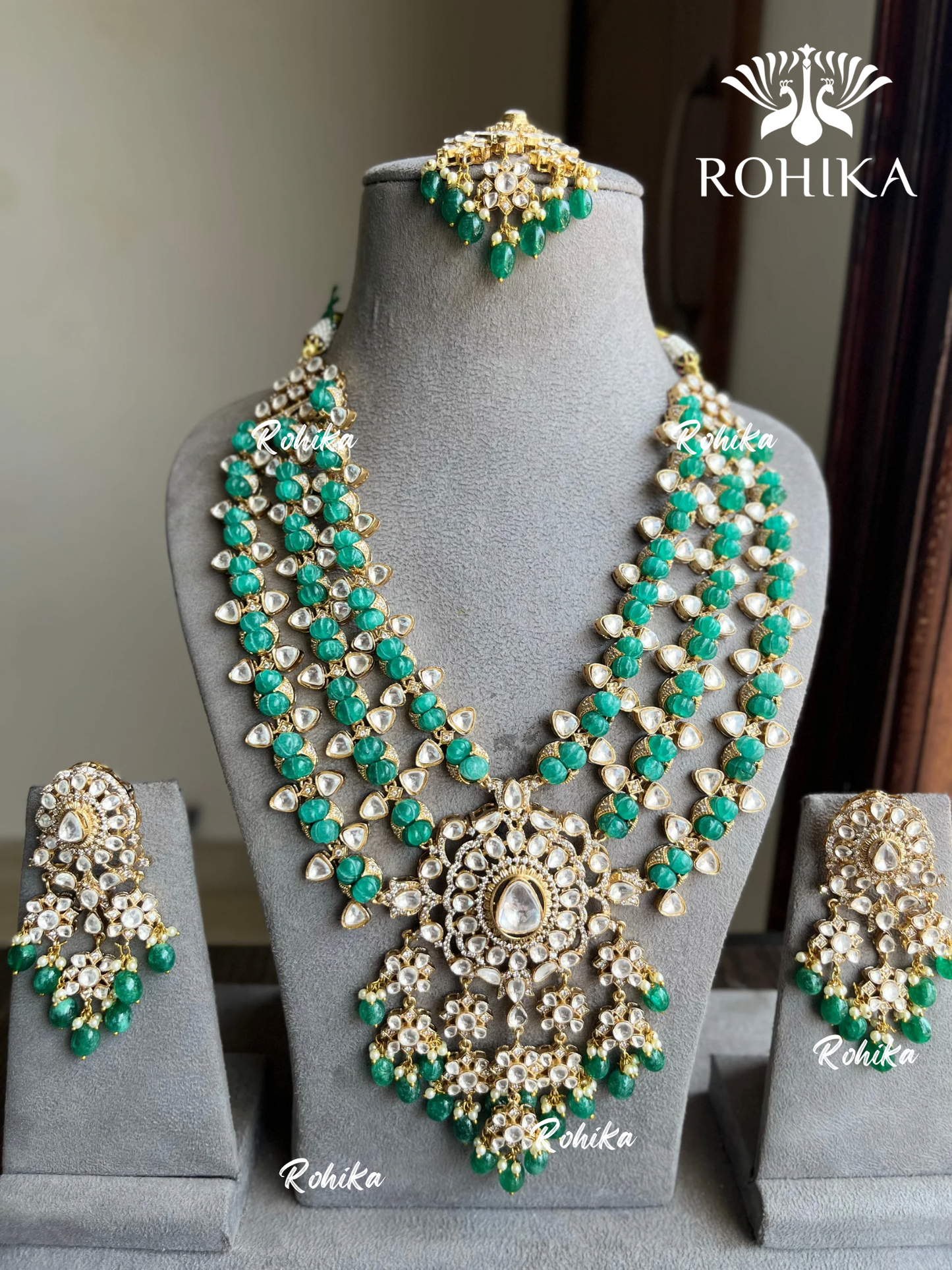 Urvi triple layer polki kundan necklace set - Dark Green